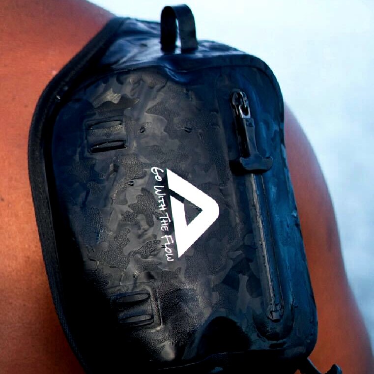 Nalu Camo Waterproof Fanny Pack - Black, worn over the shoulder
